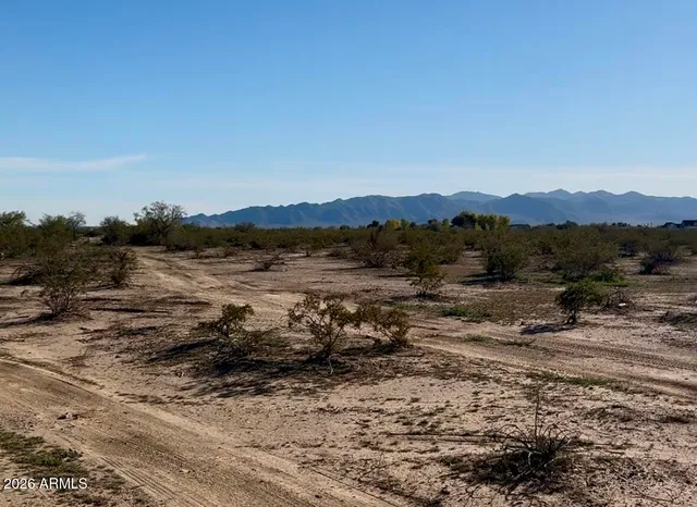 a view of lake with mountain
