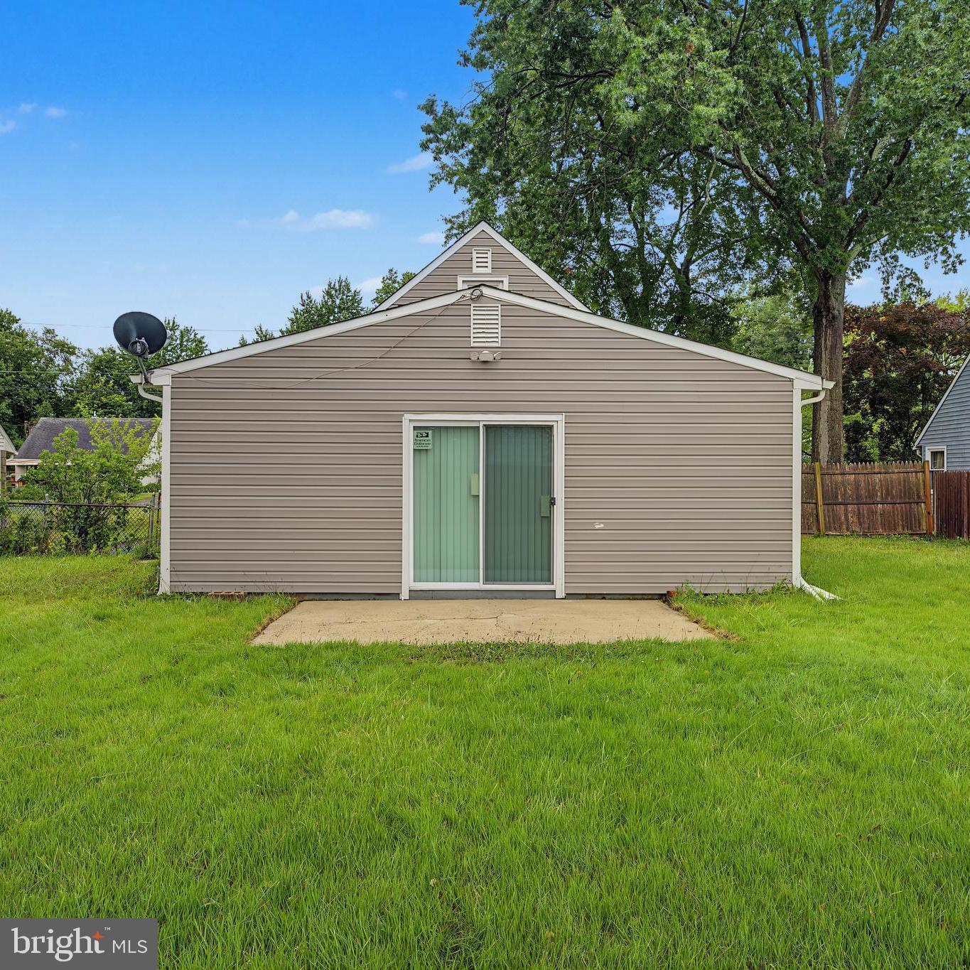 113 Rutledge Avenue Ewing, NJ 08618 - Photo 27 of 27 a front view of a house with a yard