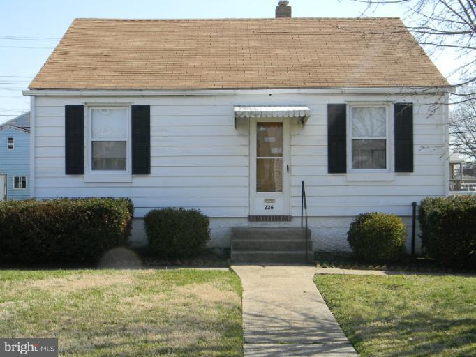 226 Pinewood Road Dundalk, MD 21222 - Photo 12 of 12 a front view of a house with a yard