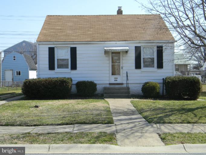226 Pinewood Road Dundalk, MD 21222 - Photo 9 of 12 a front view of a house with garden