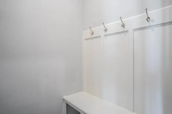 a bathroom with a shower and a sink