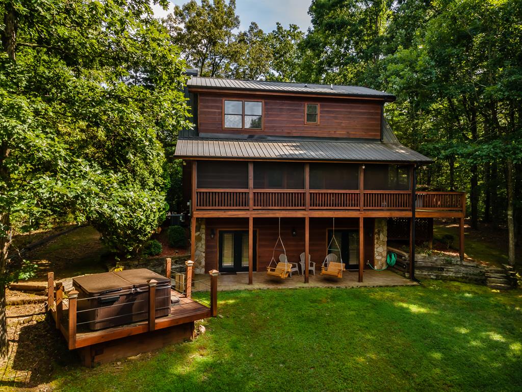 238 Hay Lane Morganton, GA 30560 - Photo 1 of 4 a view of a house with a backyard