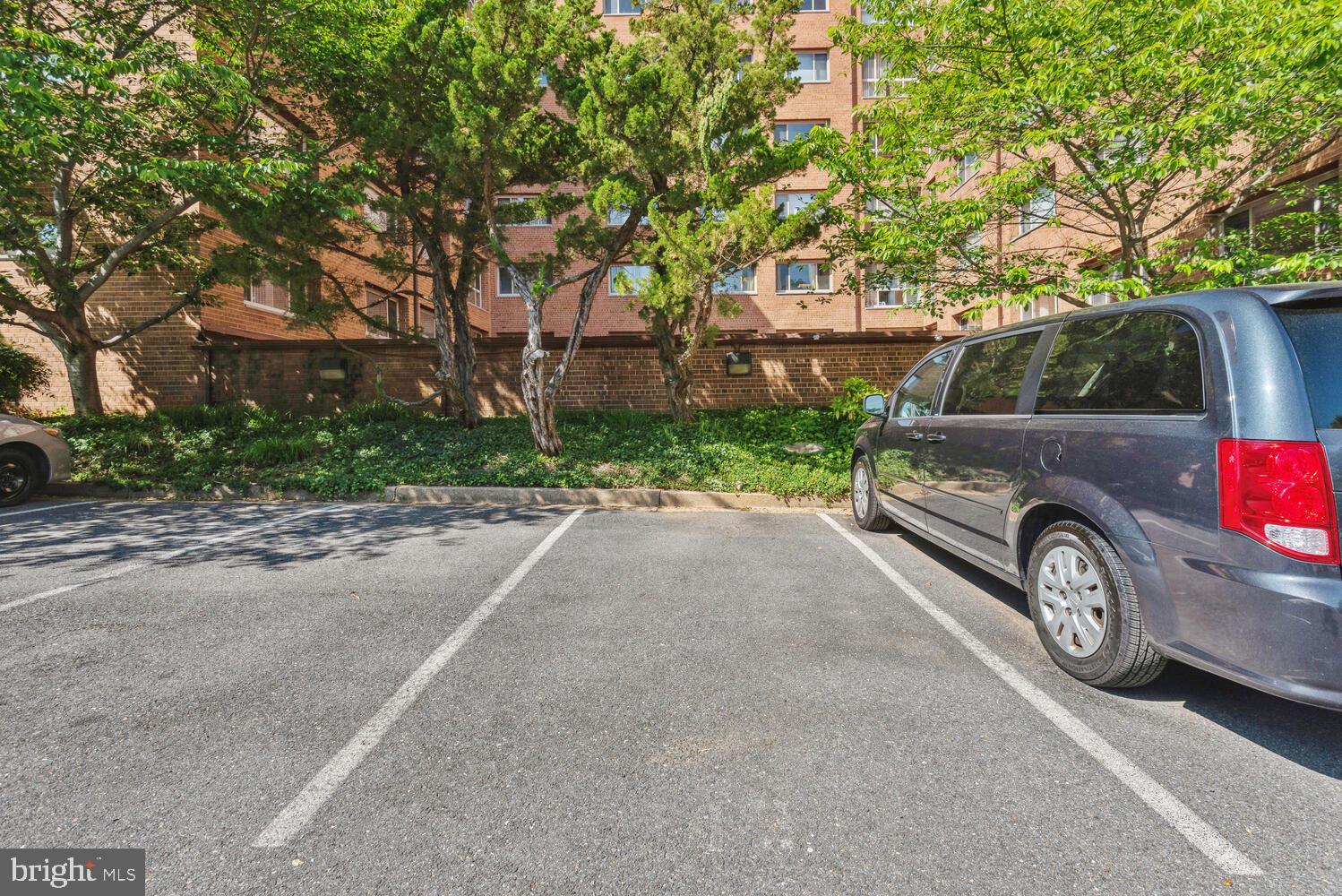 3900 Tunlaw Road Northwest, Unit 406 Washington, DC 20007 - Photo 18 of 23 a car parked in front of a house