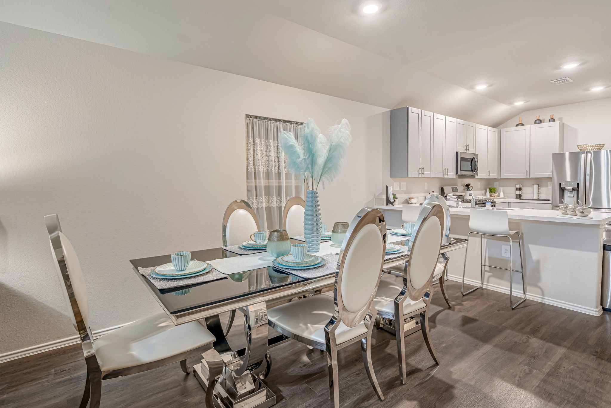 9921 Spring Creek Road Cleveland, TX 77327 - Photo 13 of 30 a view of a dining room with furniture and a window