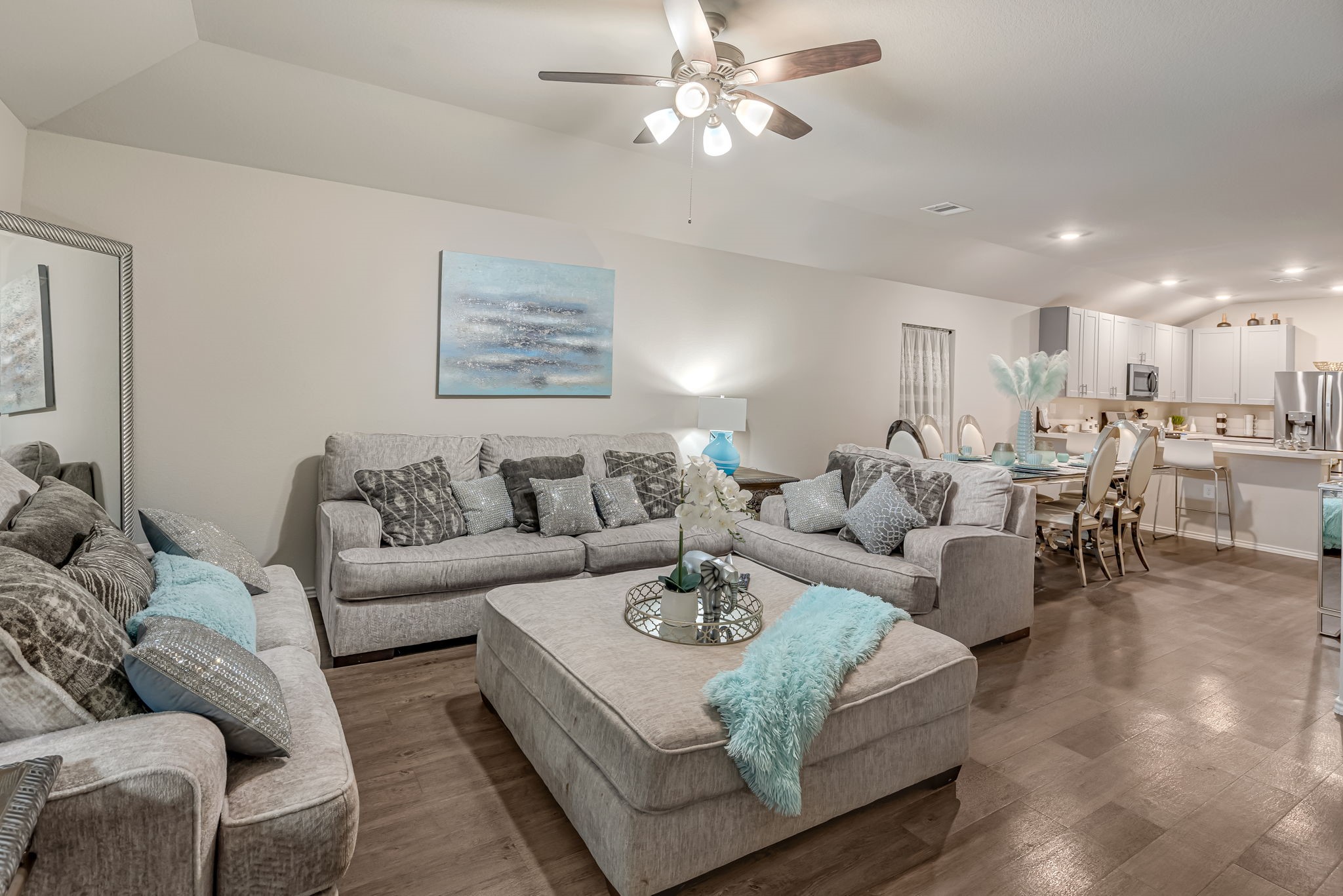 9921 Spring Creek Road Cleveland, TX 77327 - Photo 16 of 30 a living room with furniture and a view of kitchen