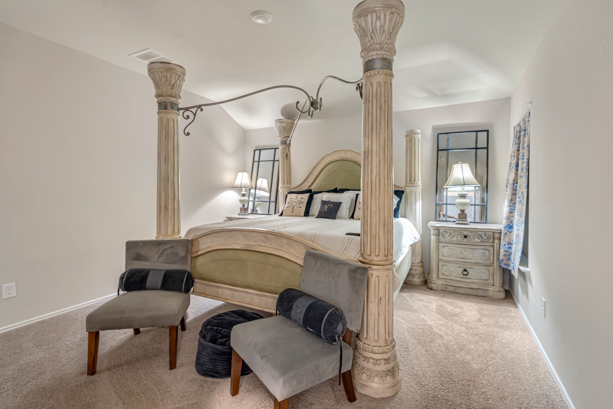 9921 Spring Creek Road Cleveland, TX 77327 - Photo 17 of 30 a bedroom with furniture and a chandelier