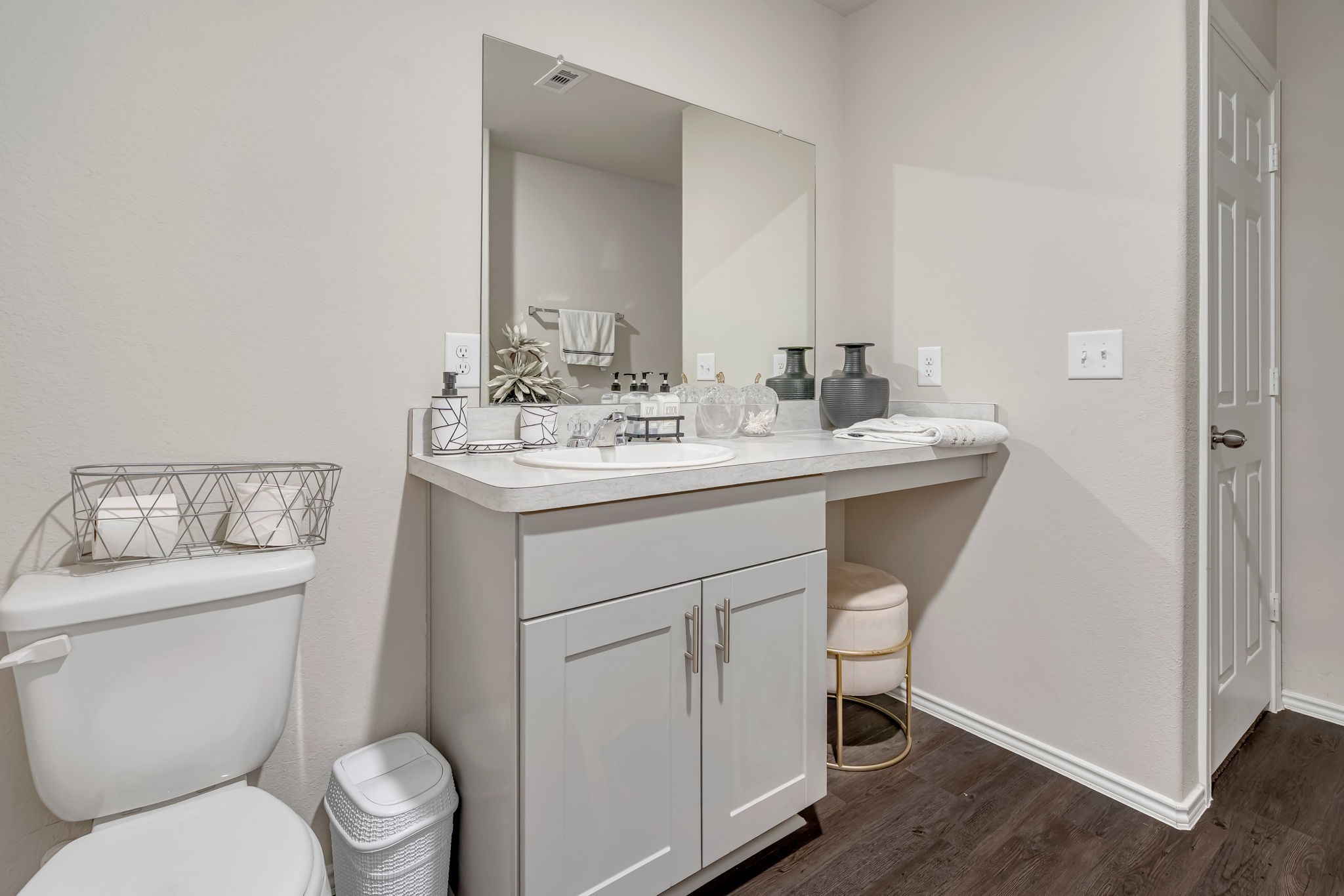 9921 Spring Creek Road Cleveland, TX 77327 - Photo 20 of 30 a bathroom with a toilet sink and mirror