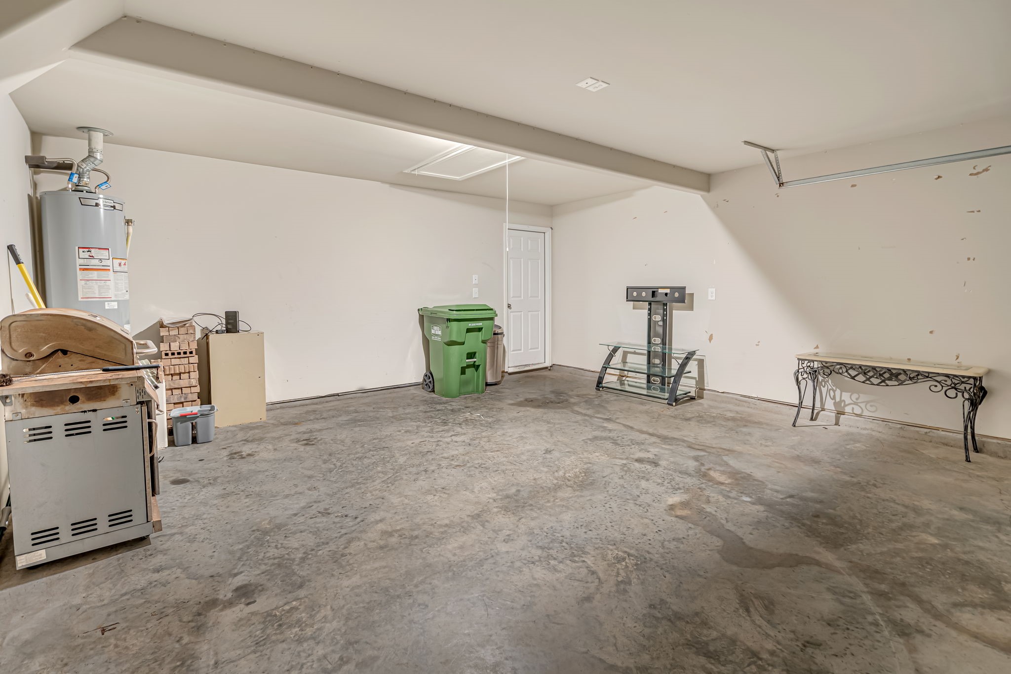 9921 Spring Creek Road Cleveland, TX 77327 - Photo 23 of 30 a view of a storage & utility room
