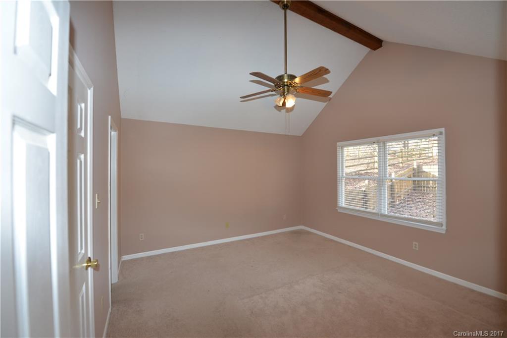 12515 Newstead Road Huntersville, NC 28078 - Photo 9 of 14 an empty room with windows and fan