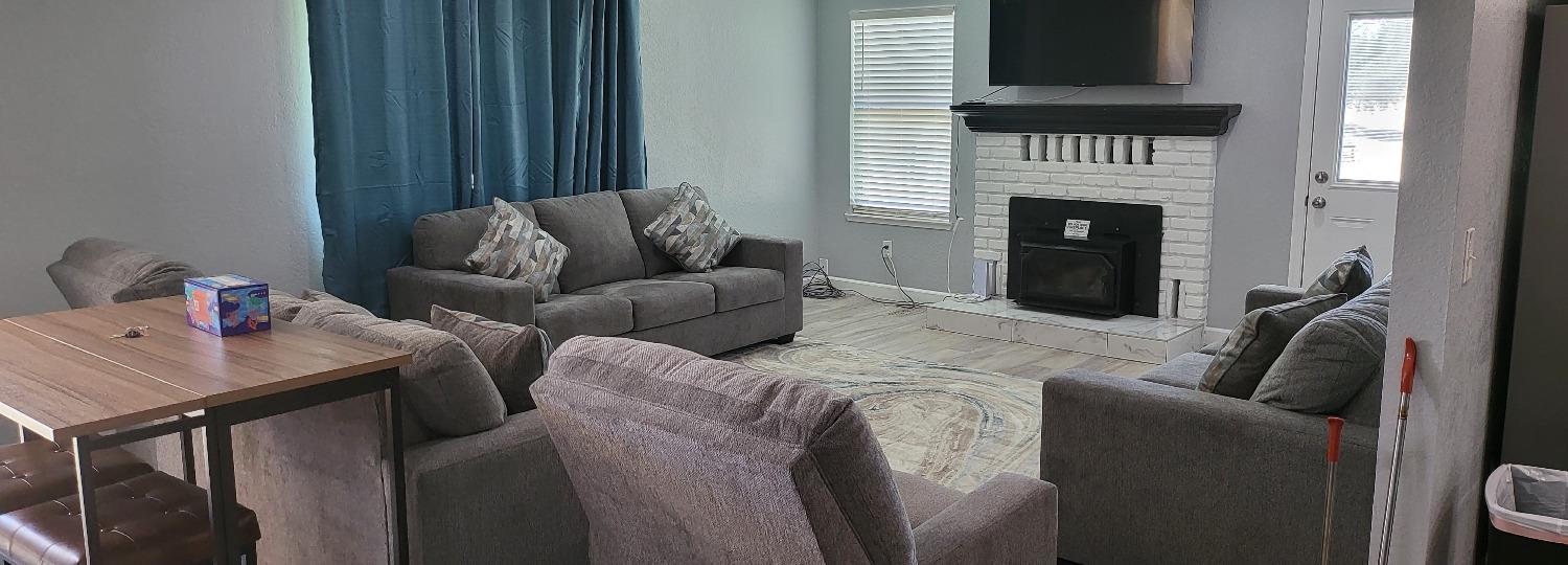 30530 George Smith Road Squaw Valley, CA 93675 - Photo 11 of 23 a living room with furniture and a fireplace