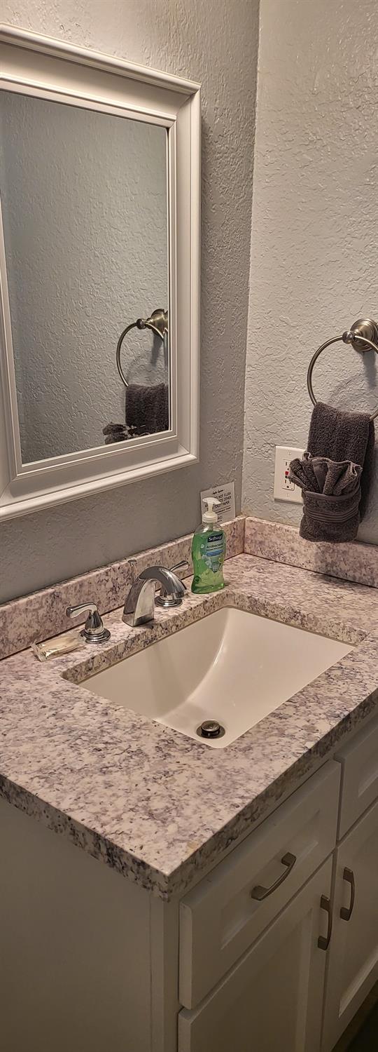 30530 George Smith Road Squaw Valley, CA 93675 - Photo 17 of 23 a view of sink and microwave