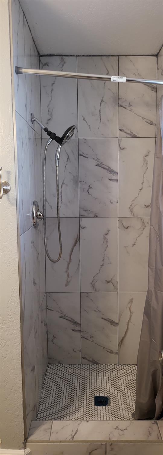 30530 George Smith Road Squaw Valley, CA 93675 - Photo 18 of 23 a bathroom with a shower