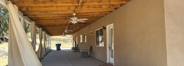 a view of hallway with a couch