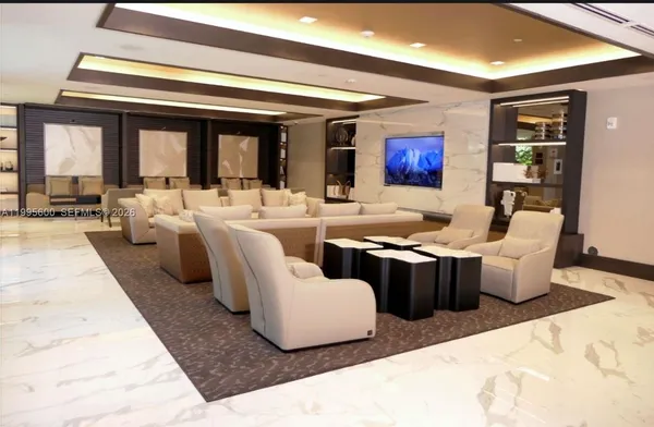 a living room with furniture and window