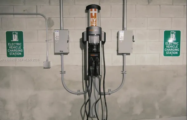 a water heater on the side of a wall