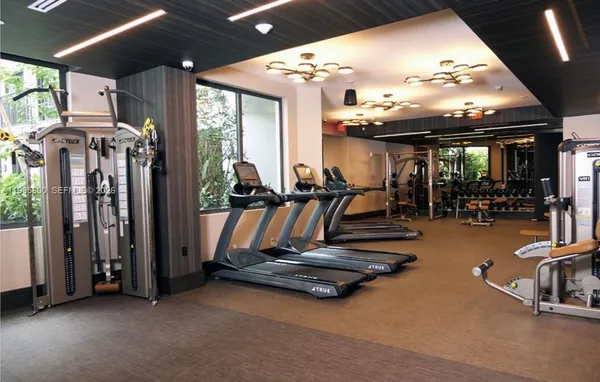 a view of a room with gym equipment