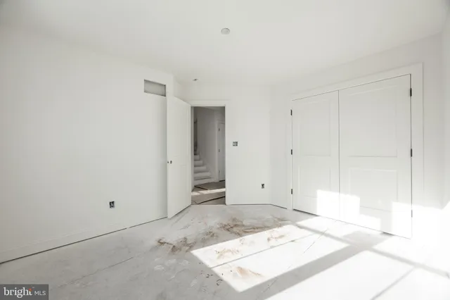 a bathroom with a tub and shower
