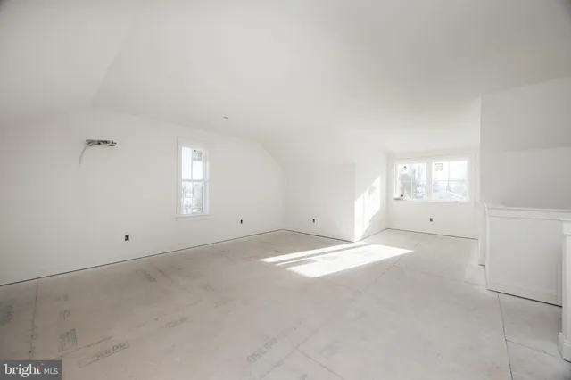 a front view of a house with a garage