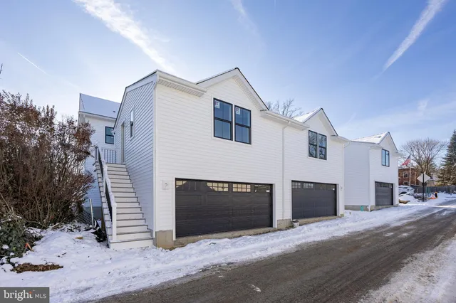 a kitchen with a sink and refrigerator