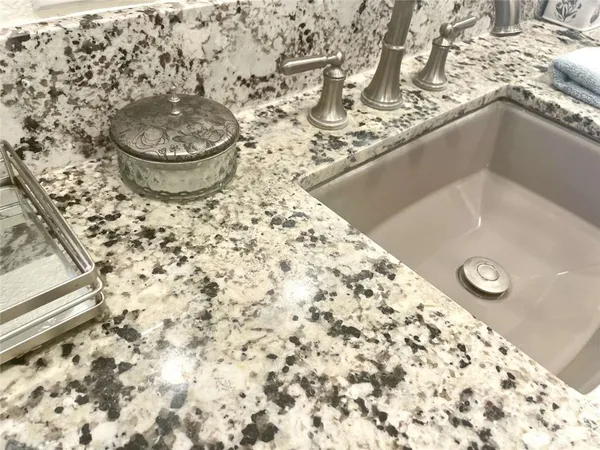 a bathroom with a sink and a toilet