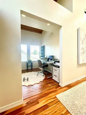 a kitchen with stainless steel appliances granite countertop a sink stove and a refrigerator