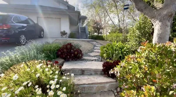 a view of a back yard of the house