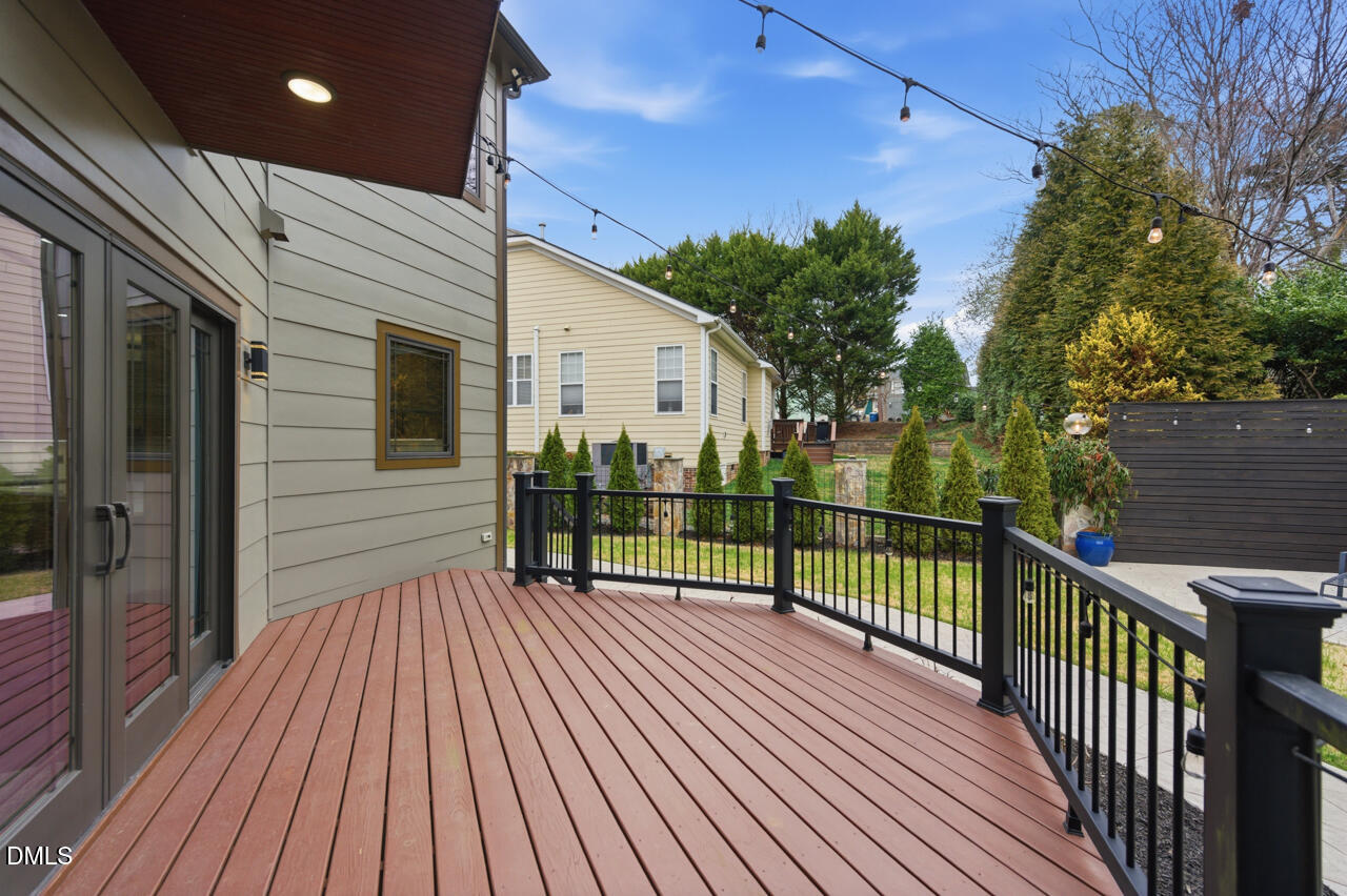 3315 Denada Path Durham, NC 27707 - Photo 59 of 74 a view of a house with a wooden deck