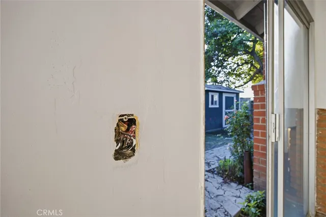 a close up of a wall with a window