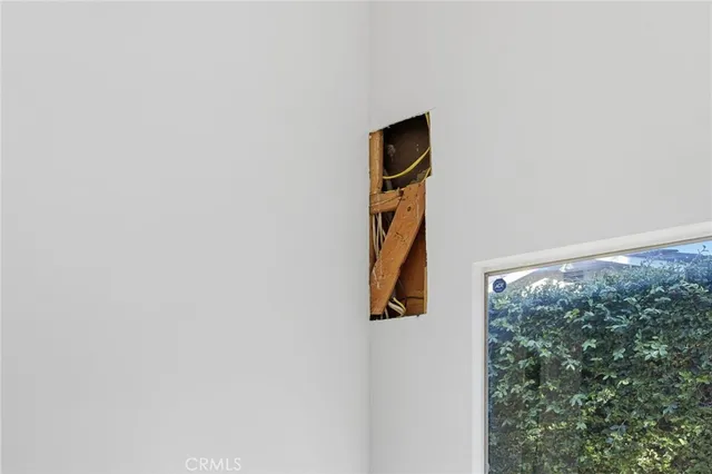 a view of cabinets a sink and dishwasher in a kitchen