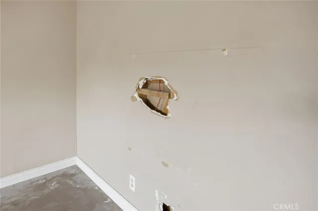 a bathroom with a toilet sink shower and mirror