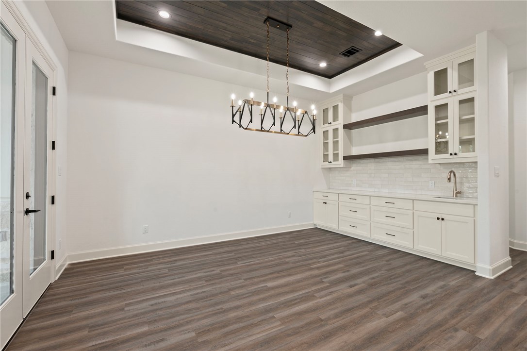 4602 Wesson Drive Bryan, TX 77808 - Photo 11 of 50 Dining area with cabinetry, sink