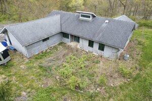 5718 West Small Road La Porte, IN 46350 - Photo 1 of 26 a aerial view of a house with a yard and large tree