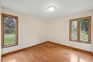 5718 West Small Road La Porte, IN 46350 - Photo 11 of 26 an empty room with windows