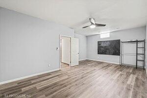 5718 West Small Road La Porte, IN 46350 - Photo 17 of 26 wooden floor in an empty room with a window