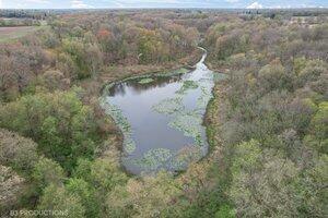 5718 West Small Road La Porte, IN 46350 - Photo 5 of 26 a aerial view of a house with a yard and lake view