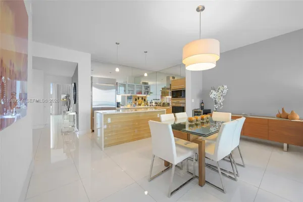 a view of a dining room and livingroom