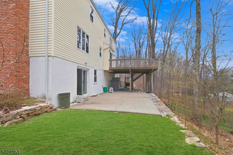 14 Beaver Ridge Road Morris Plains, NJ 07950 - Photo 3 of 39 a view of a house with backyard and a tree