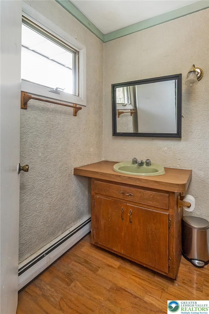 135 Haney Road Kunkletown, PA 18058 - Photo 24 of 53 a bathroom with a sink mirror and vanity