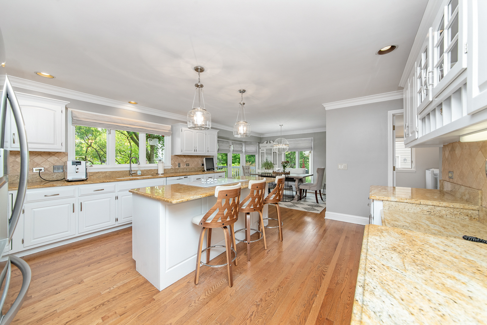N440 Peter Road Winfield, IL 60190 - Photo 13 of 34 a large kitchen with a table and chairs