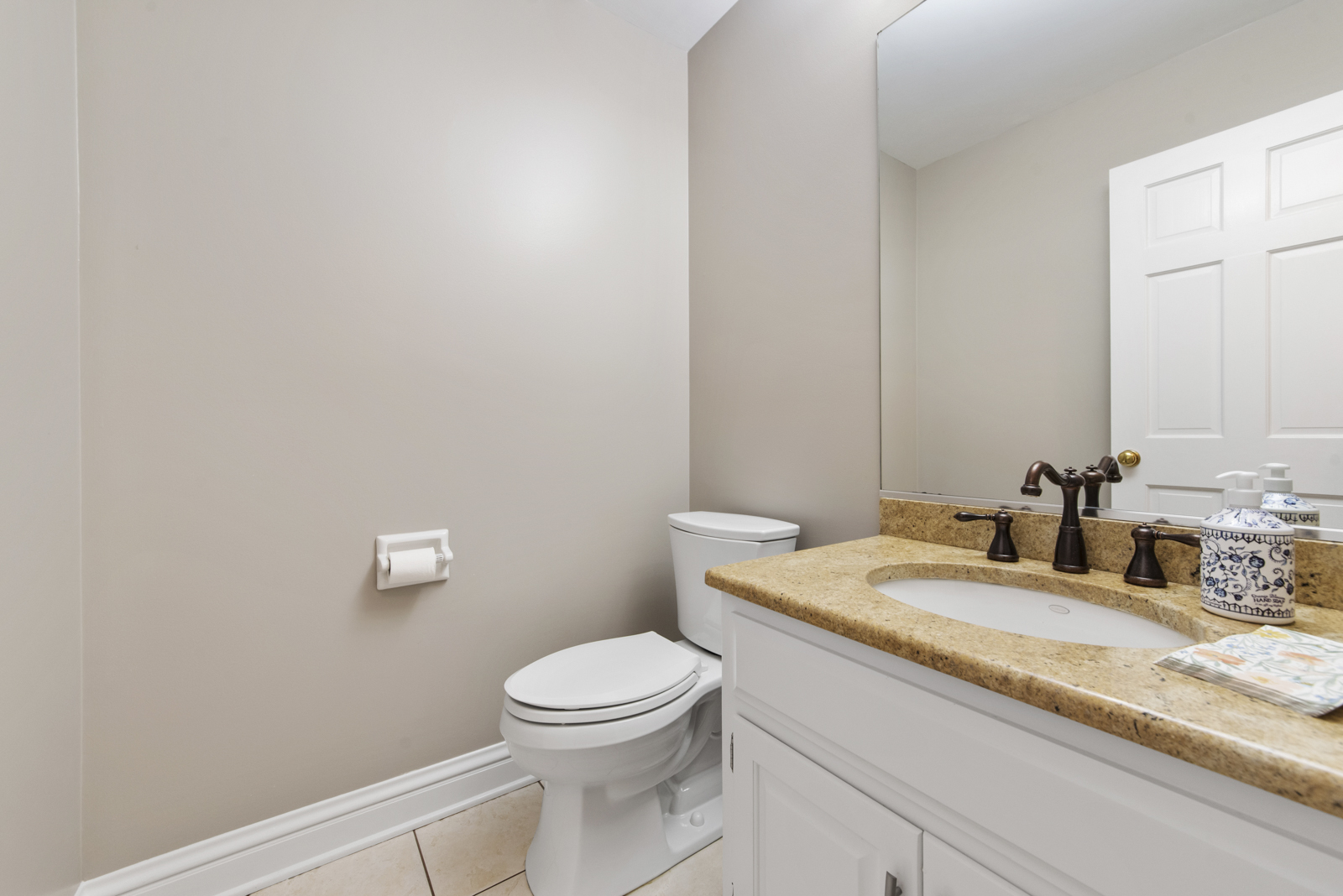 N440 Peter Road Winfield, IL 60190 - Photo 16 of 34 a bathroom with a granite countertop toilet and sink