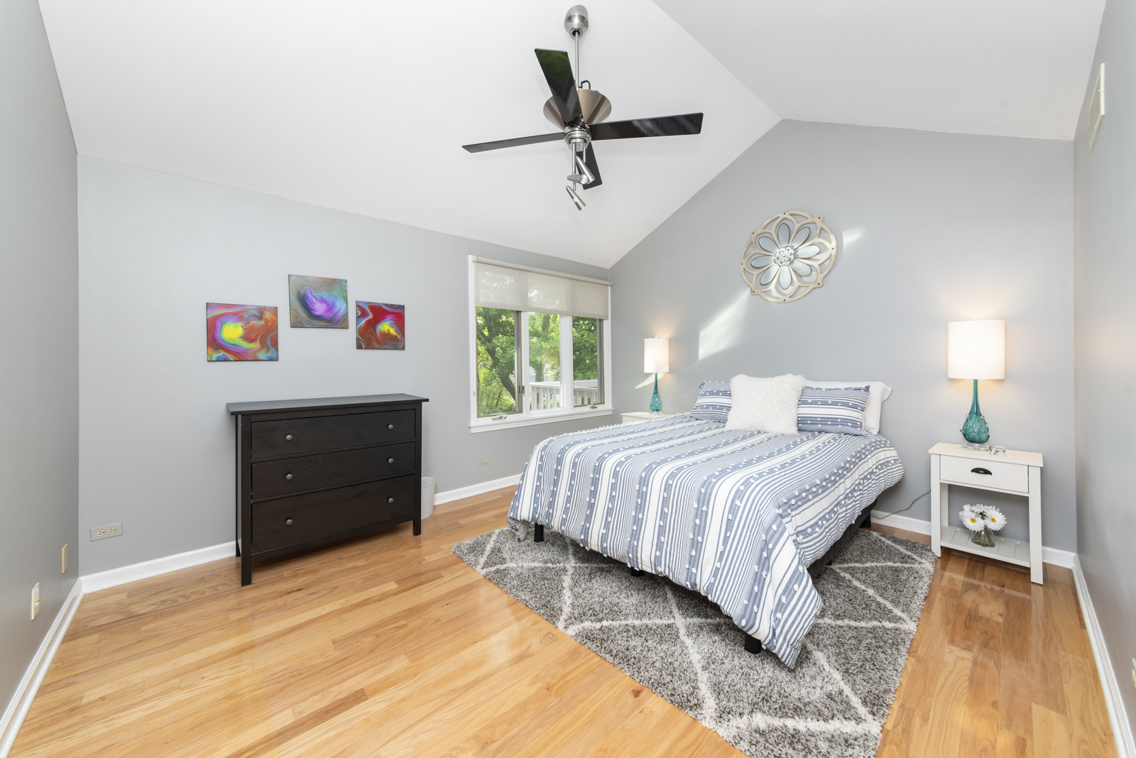 N440 Peter Road Winfield, IL 60190 - Photo 24 of 34 a bedroom with a bed and a chandelier