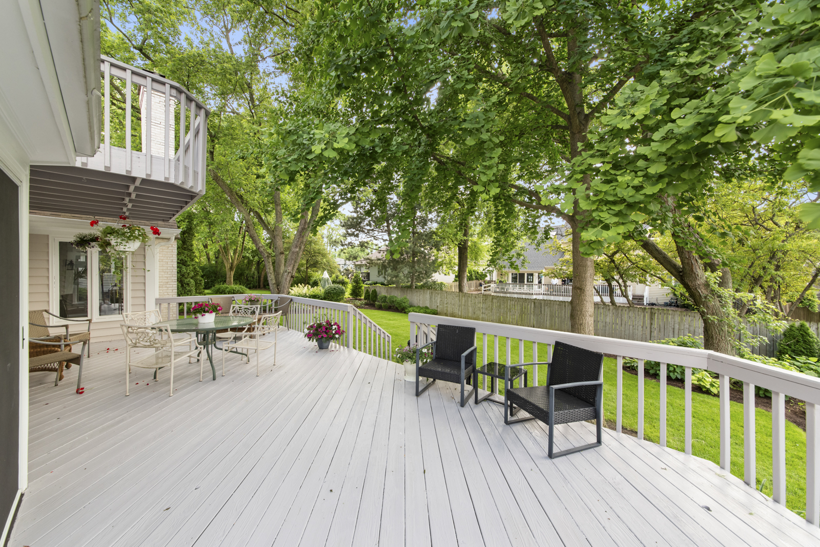 N440 Peter Road Winfield, IL 60190 - Photo 32 of 34 a view of deck with table and chairs wooden floor and fence