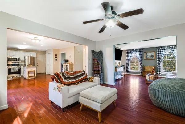 a view of a living room and dining room