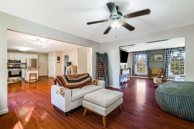 a view of a living room and dining room