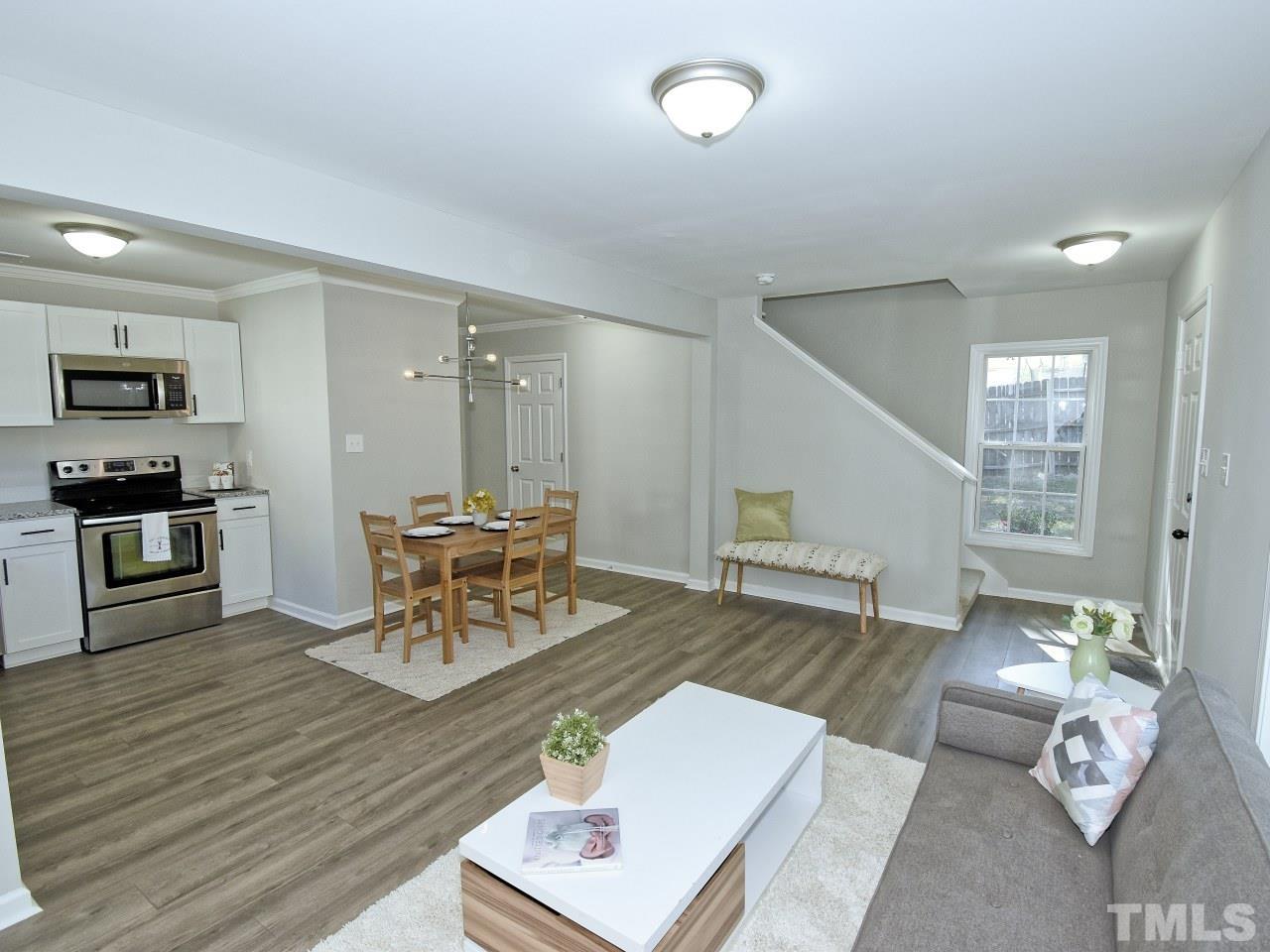 3606 Meriwether Drive Durham, NC 27704 - Photo 4 of 23 a living room with furniture and a wooden floor