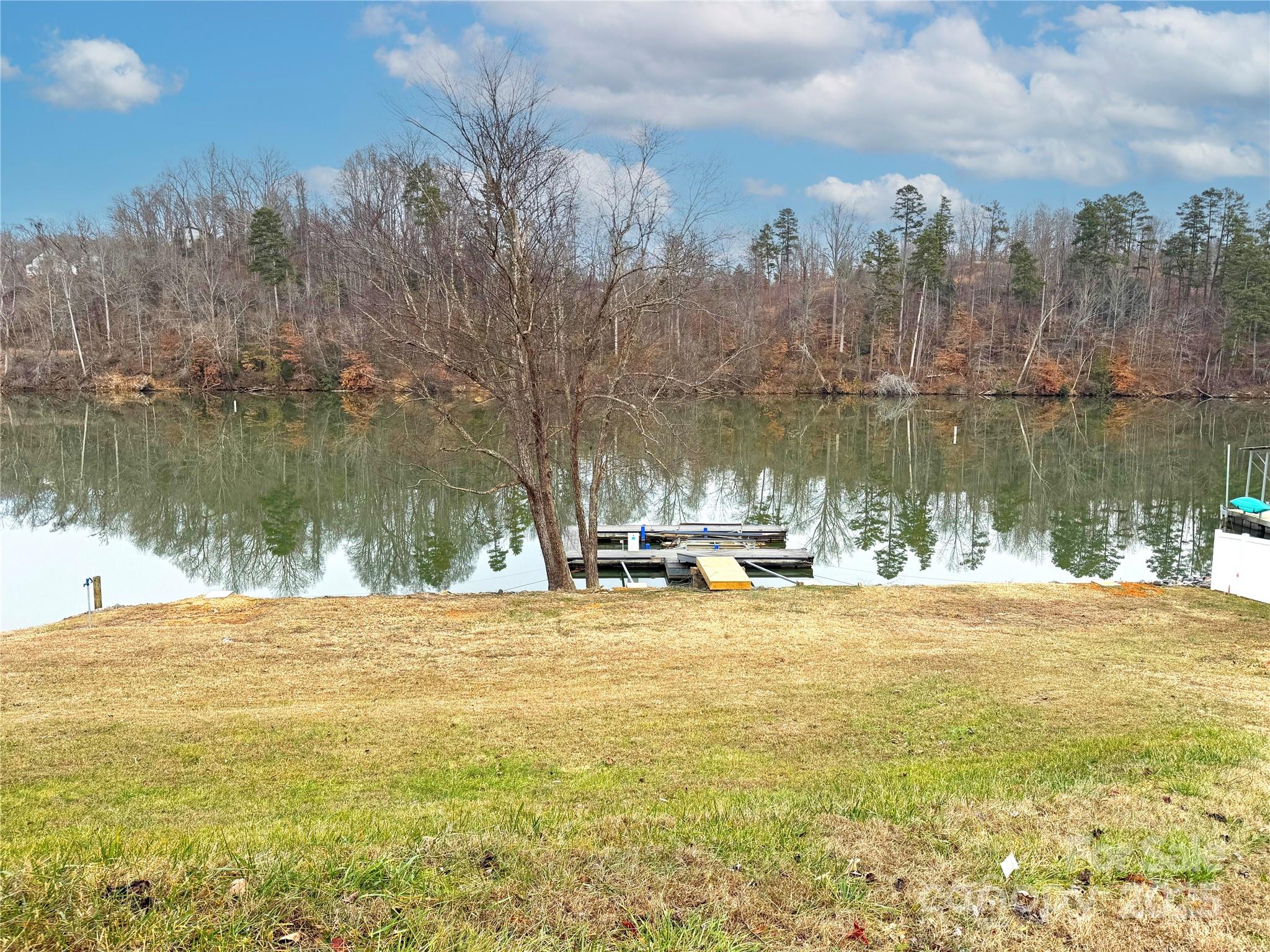 207 Catawba Avenue Hickory, NC 28601 - Photo 3 of 11 a view of a lake with houses in the back