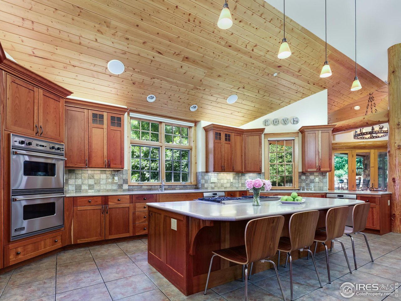 3015 3rd Street Boulder, CO 80304 - Photo 12 of 40 Chef's Kitchen with Cherry Cabinetry and Soaring Ceilings