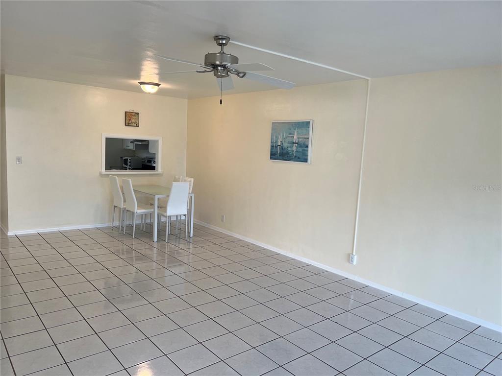 1433 South Belcher Road, Unit B7 Clearwater, FL 33764 - Photo 19 of 25 a workspace with wooden floor