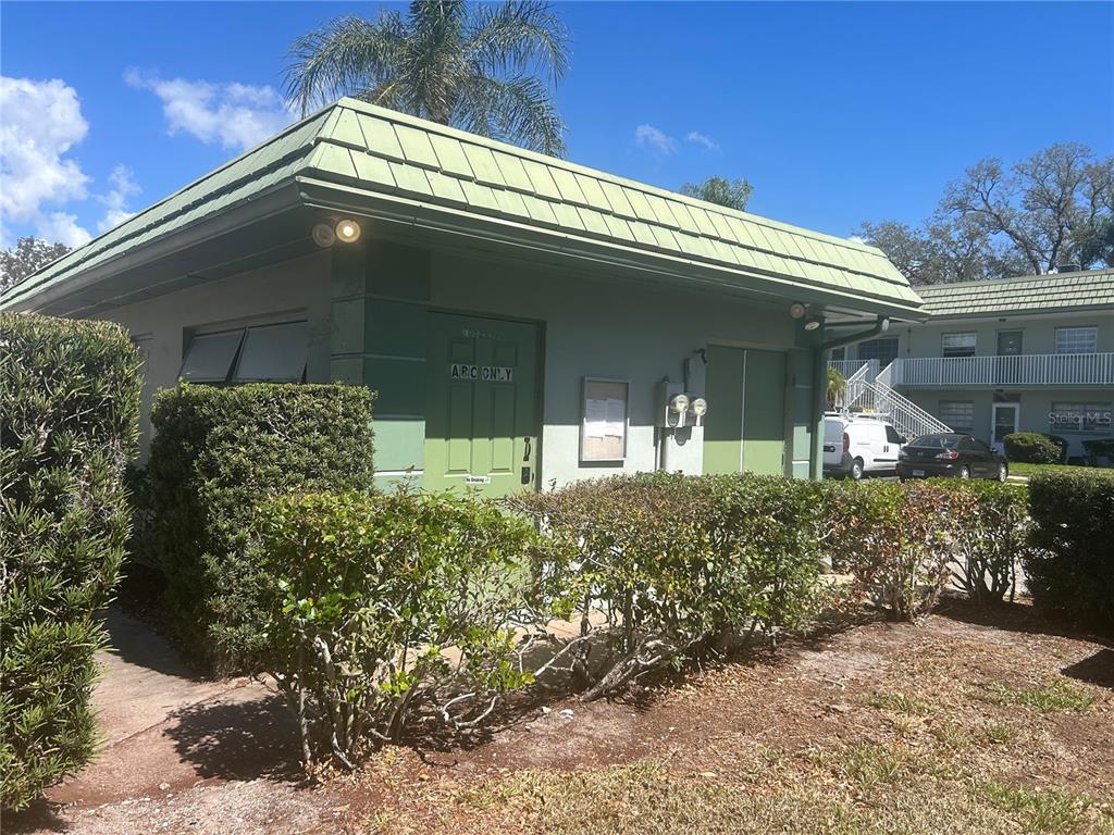 1433 South Belcher Road, Unit B7 Clearwater, FL 33764 - Photo 22 of 25 front view of a house