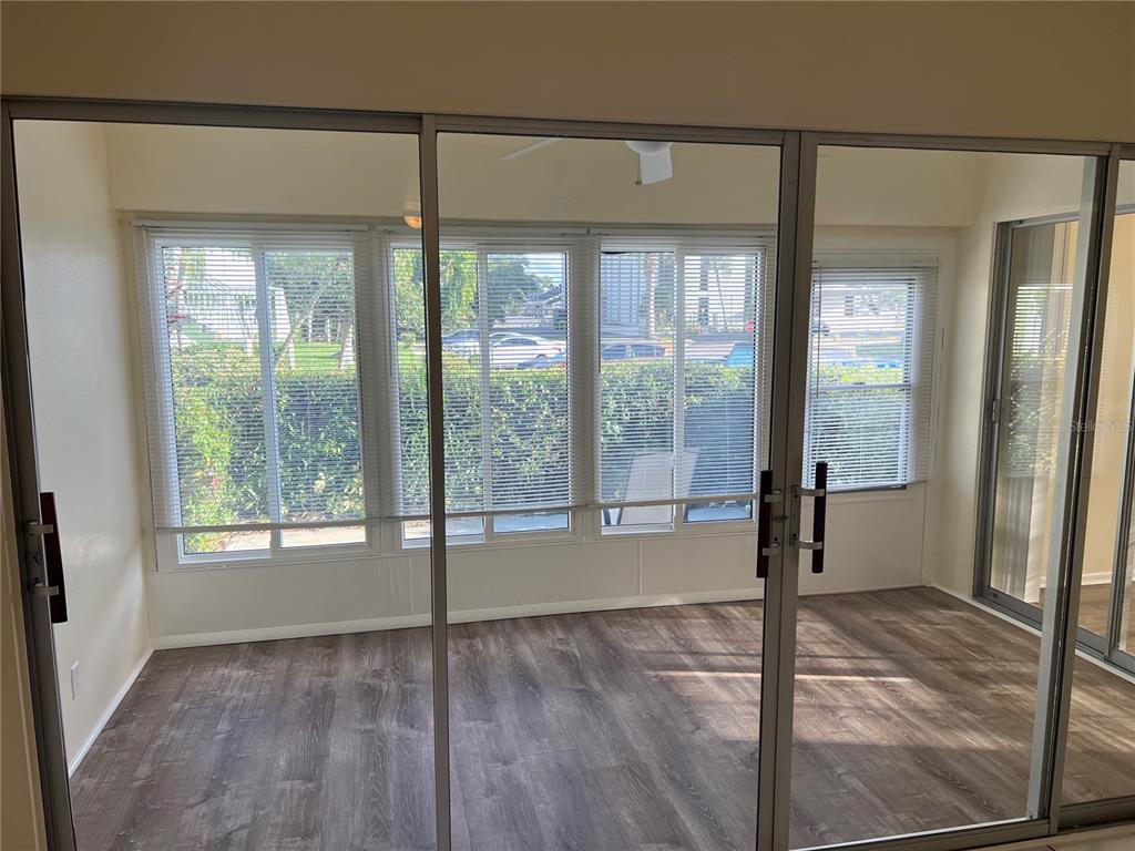 1433 South Belcher Road, Unit B7 Clearwater, FL 33764 - Photo 10 of 25 a view of an empty room and window